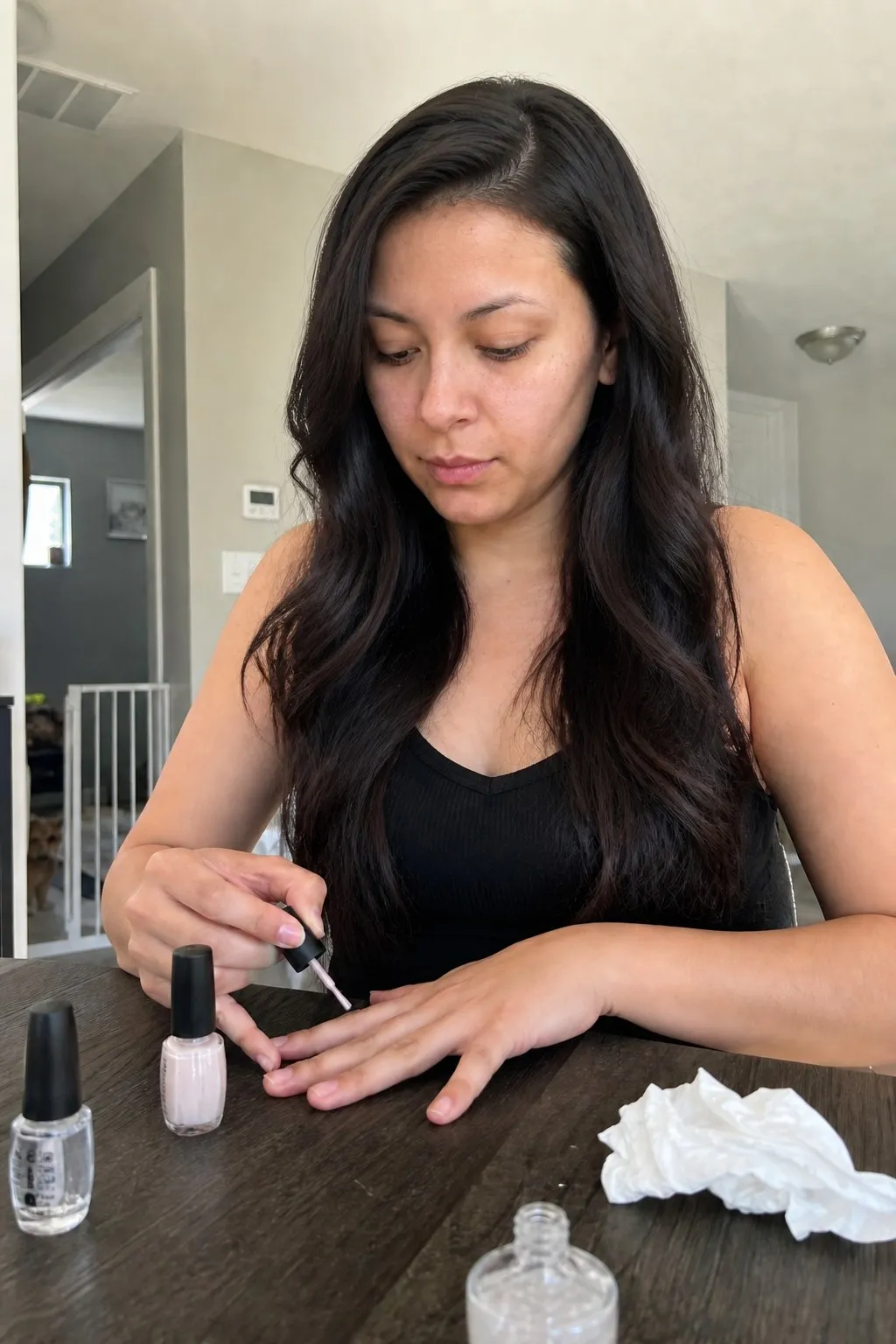 A woman with an oblong face before and after side part with soft waves - after