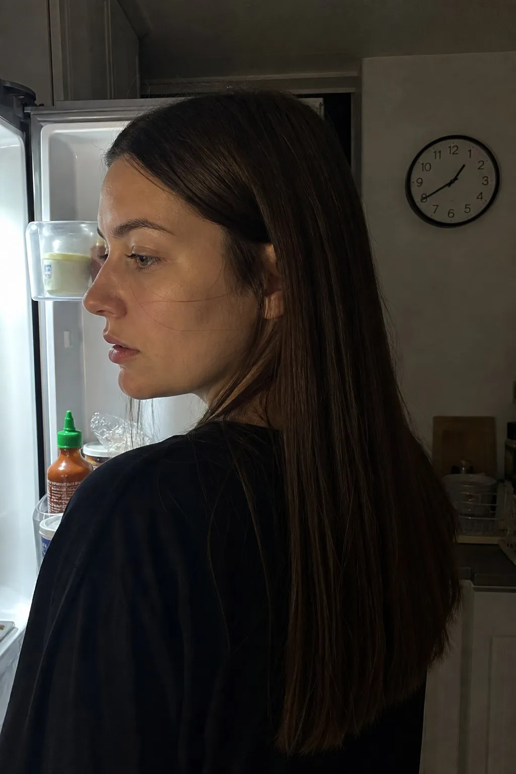 A woman with a square face before and after long layers - before